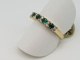 14kt yellow gold ring with natural emeralds and diamonds